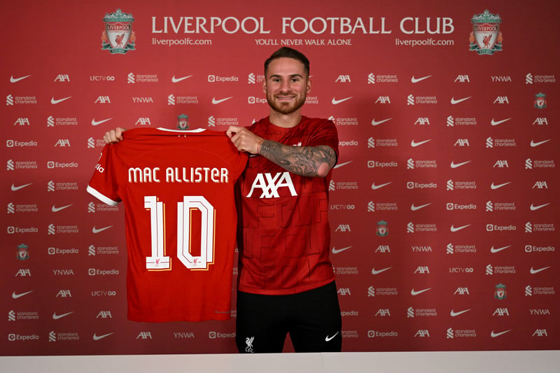 Alexis Mac Allister signing for Liverpool Football Club at AXA Training Centre on June 8