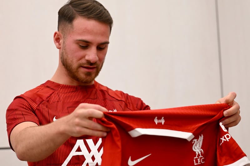 Alexis Mac Allister signing for Liverpool Football Club at AXA Training Centre on June 8