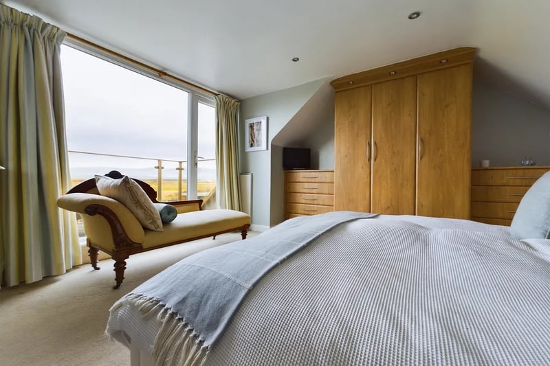 One of the property’s four bedrooms benefits from the same spectacular views.