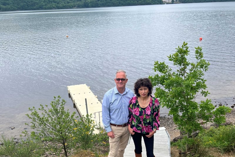 As can be seen in the background behind General Manager Steven Williams and wife Patty Williams, the holiday lodge has its very own private jetty with 