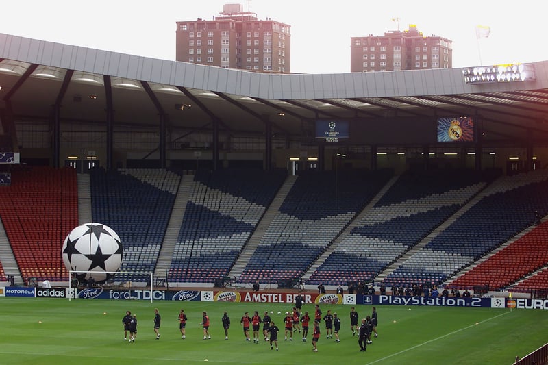 The Real Madrid team warm up during a training session at Hampden Park. 