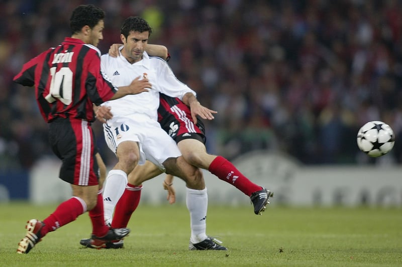 Luis Figo  is tackled by Yildiray Basturk and Diego Rodolfo Placente of Bayer Leverkusen during the final. He had caused all sorts of controversy two years previous when he joined Real Madrid from rivals Barcelona. 