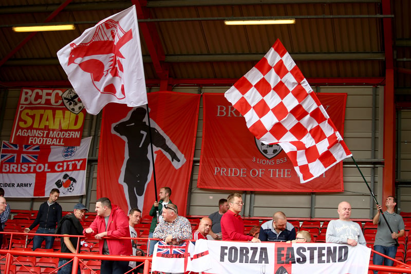 Against Burnley, fans have a flags display, as they take their place in the singing section. 