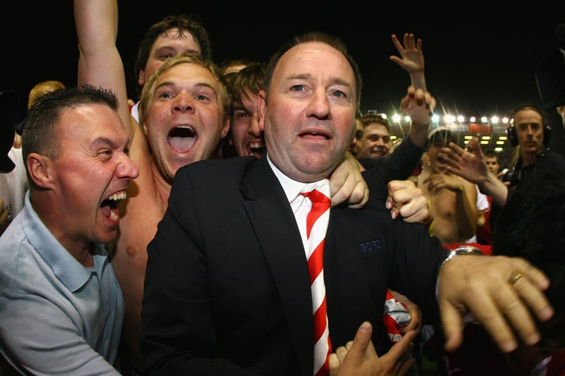 Fans surround Gary Johnson to show their admiration after Bristol City beat Crystal Palace.
