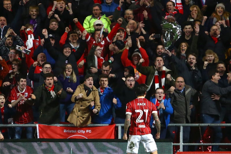 Marlon Pack celebrates with Bristol City fans after their first goal against Manchester United. 