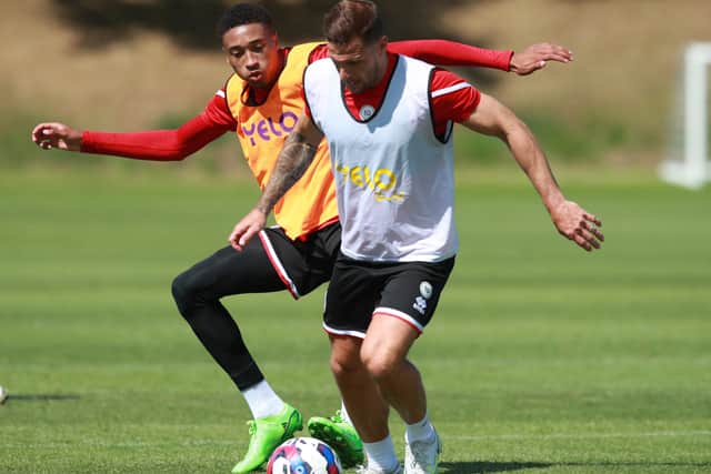 Billy Sharp in Sheffield United training with Daniel Jebbison 