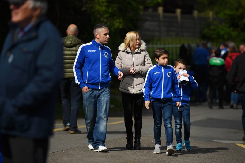 A family come together to support Bristol Rovers. 
