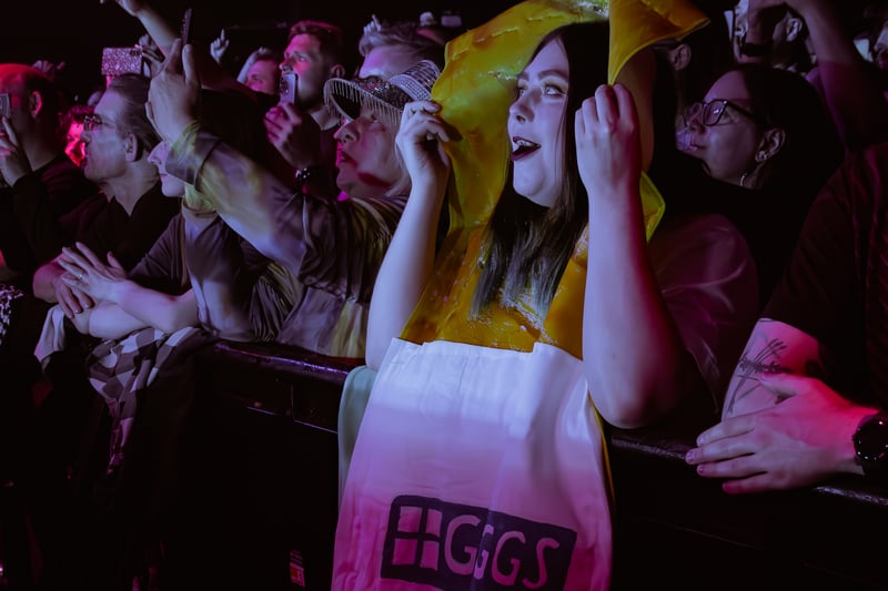 A fan at front barrier dressed as a sausage roll. The original sausage roll of course, and not the vegan variation, as specified by the fan when asked by Dead Pony lead singer Anna Shields.