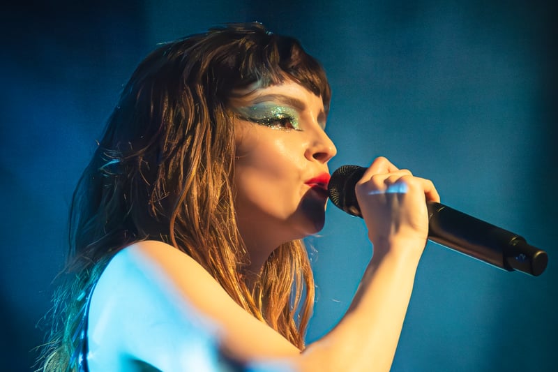 Lauren Mayberry went through a number of outfit changes through the set. 