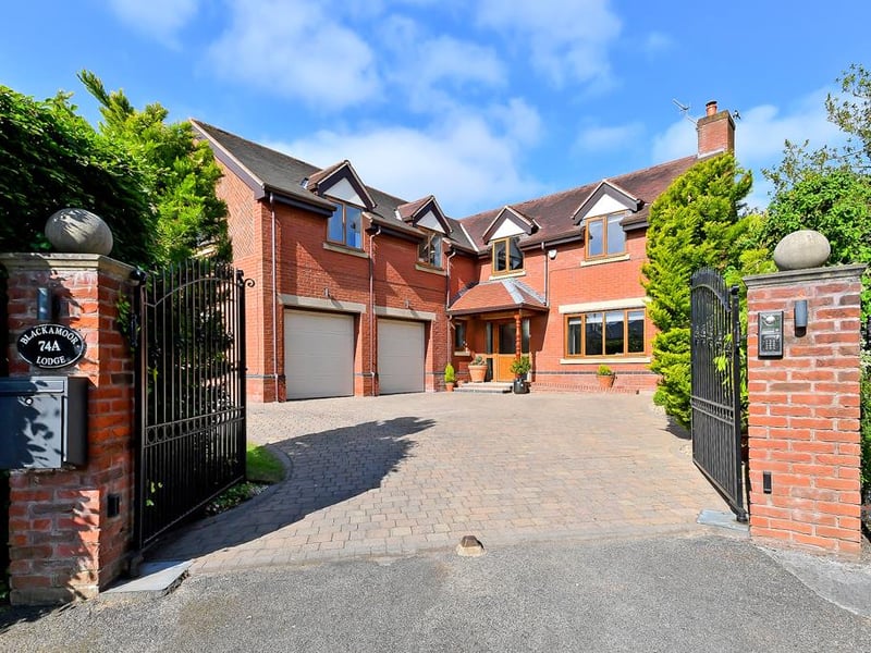 The house is found inside a gated plot, providing extra security and privacy.