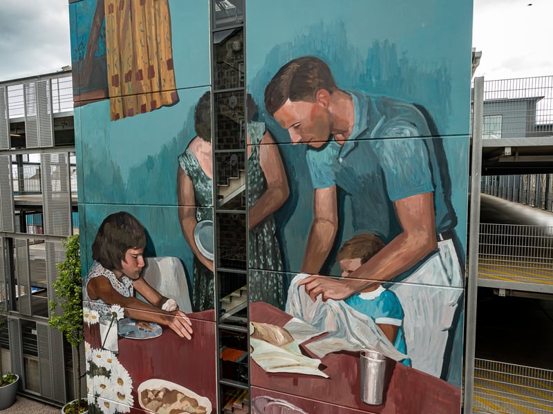 Painter and muralist Mohamed L'Ghacham created art around the world before landing in Aberdeen for Nuart. With his family portrait which shows a family sitting down for dinner, the Morocco-born artist painted a universal family scene. Despite the domestic scene, the mural sits in a mostly industrial area, hidden on Lime Street which sits on Waterloo Quay along the harbour.