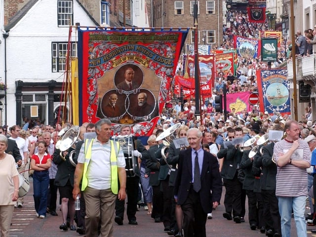 New Herrington Lodge head past the balcony of the County Hotel.