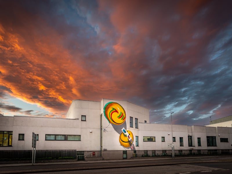 London-based graffiti artist Fanakapan has been creating art since the early 2000s. Self-taught, his art features subjects such as balloons using 3D effects to make work pop from the surface. His dynamic 2021 work floats across Aberdeen Health Village, and took more than 40 hours to complete. The artist also helped KMG with a bonus balloon on her mural the same year.