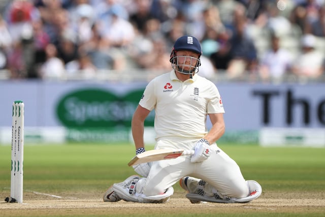 England batsman Jonny Bairstow reacts as the ball goes through off his glove to be caught by Cameron Bancroft during the fifth day of the 1st Test match between England and Australia at Edgbaston on August 05, 2019 in Birmingham, England. (Photo by Stu Forster/Getty Images)