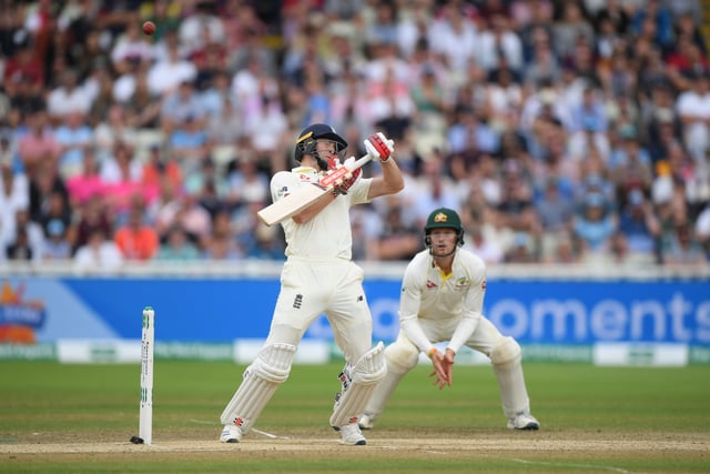 England batsman Chris Woakes is caught by Steve Smith off the bowling of Pat Cummins during the fifth day of the 1st Test match between England and Australia at Edgbaston on August 05, 2019 in Birmingham, England. (Photo by Stu Forster/Getty Images)