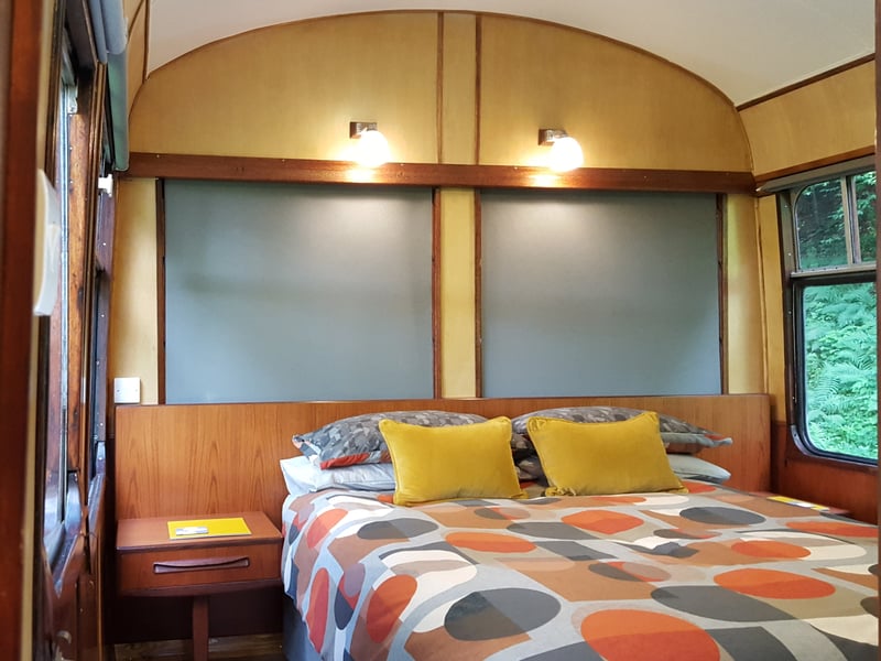 The bedroom inside the renovated coach
