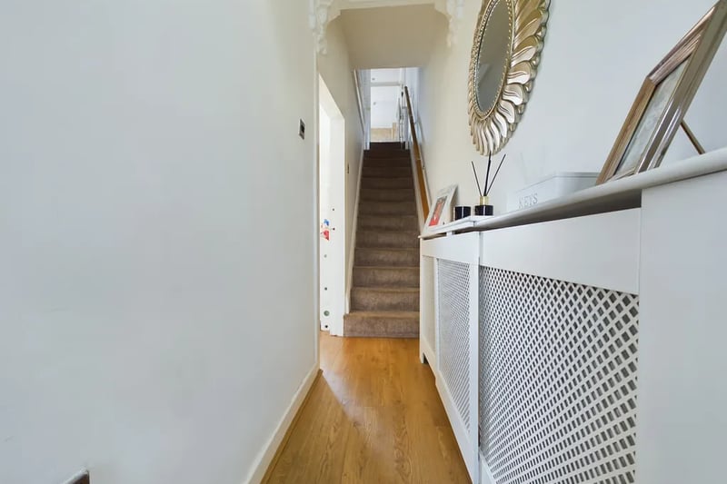 “As you step inside, you’ll be greeted by a welcoming hallway leading on to the living room, providing a warm and inviting atmosphere,” the listing reads.