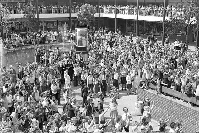 The crowds wave to Prince Charles during his visit to Peterlee in 1978.