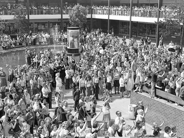 The crowds wave to Prince Charles during his visit to Peterlee in 1978.