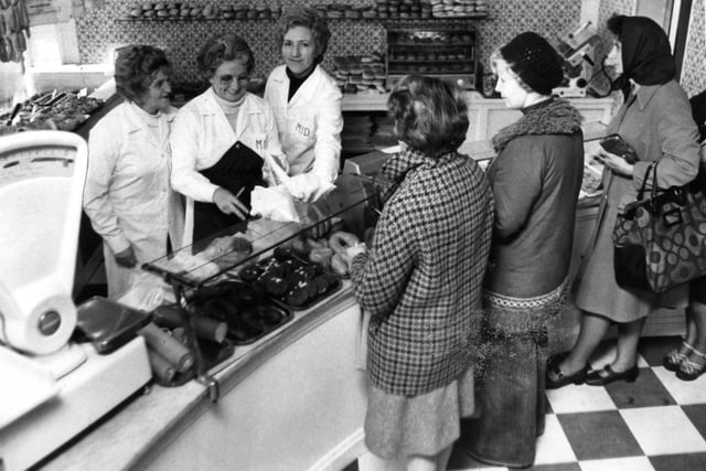 Another flashback to a time past, as Dicksons staff and customers are photographed in 1976.