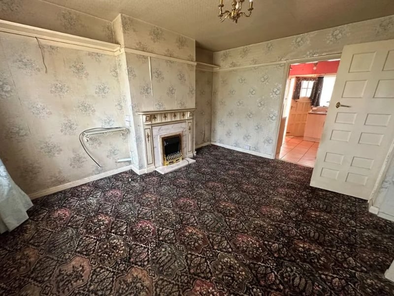 The home has a small fitted fireplace which would be perfect in the winter