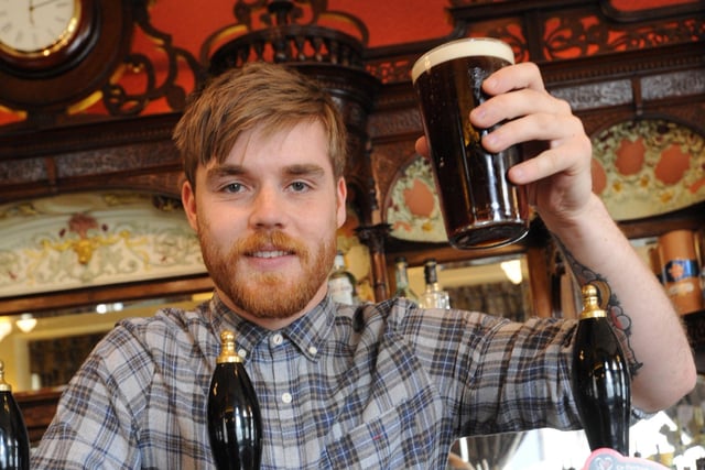 The Dun Cow's assistant manager Daniel Iley celebrates the pubs Good Beer Guide success 8 years ago.