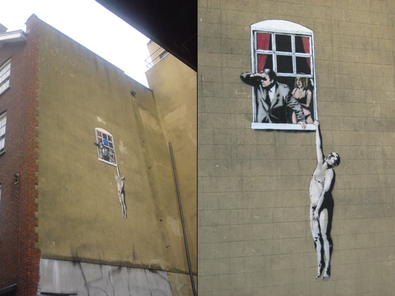 ‘Naked Man Hanging From Window’ or ‘Naked Man’ is situated on a wall in Bristol’s Frogmore Street. The famous mural depicts a man hanging from a window after his affair with a woman was discovered by her husband. Funnily enough, the piece was drawn onto the side of a sexual health clinic (which was apparently a “happy accident” by Banksy.)