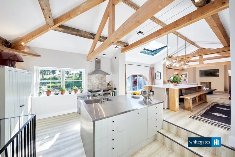 “The main living accommodation offers open kitchen/diner, lounge enjoying a pleasant aspect over the rear of the property with bespoke fixtures throughout as well as underfloor heating.”