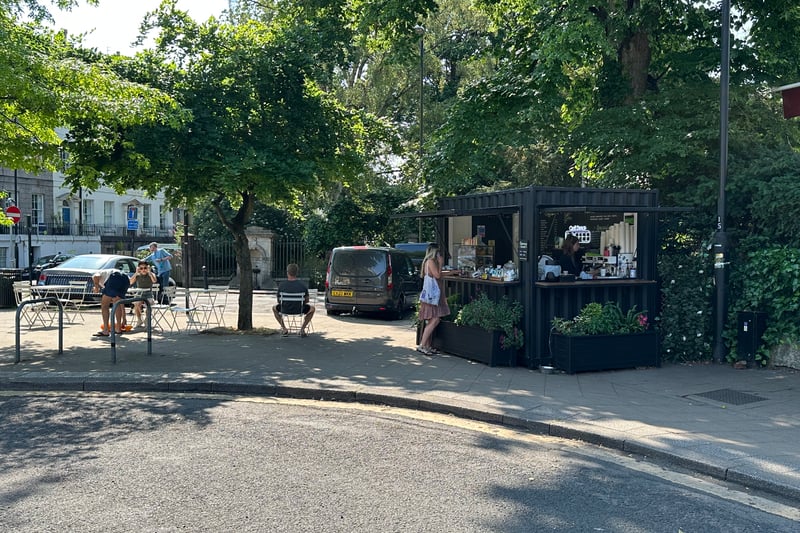 As the sun beats down, a few people take to the shade for a coffee at Can’t Dance Coffee stall on Victoria Square in Clifton.
