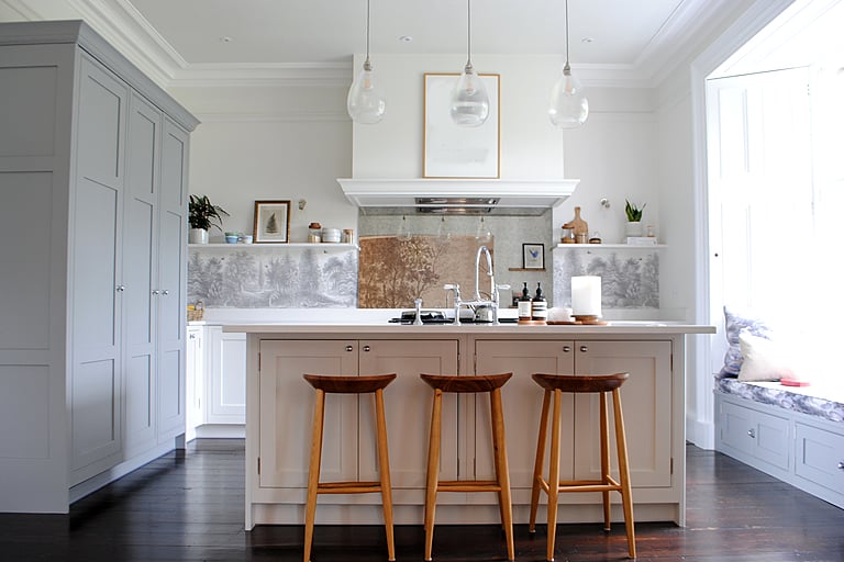 The light and airy kitchen comes complete with a breakfast bar.