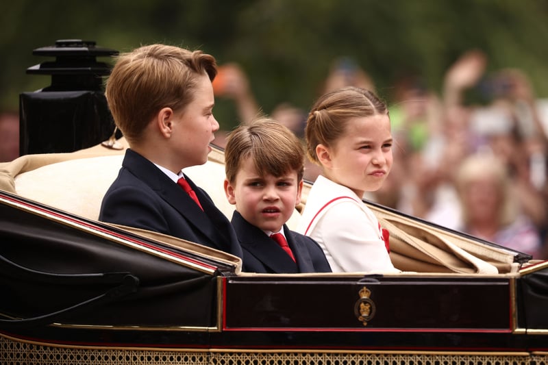 Prince George, Prince Louis and Princess Charlotte leave Buckingham Palace. (Photo by HENRY NICHOLLS / AFP) (Photo by HENRY NICHOLLS/AFP via Getty Images)