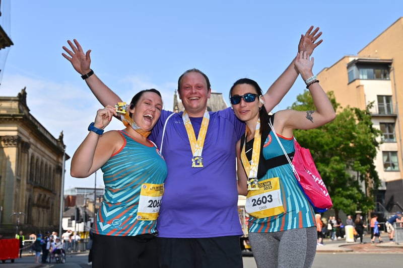 Happy runners with their medals. Photo: Run For All