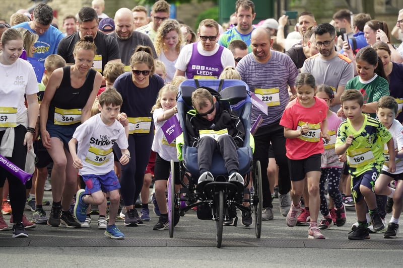 Rob and his family sets off on their lap of honour along with the rest of the Mini race contestants.Photo: Run For All