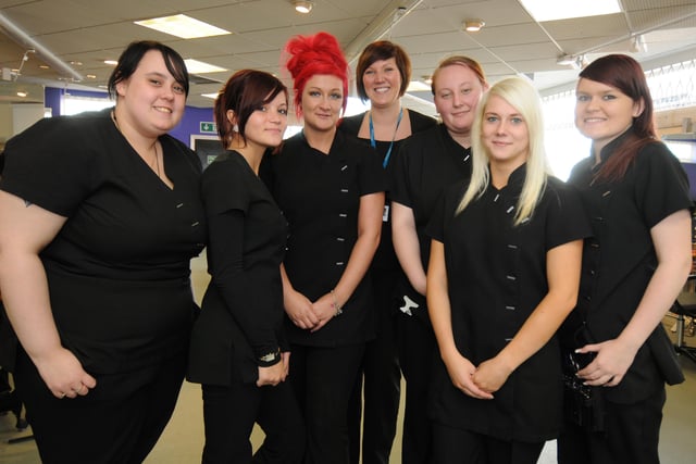 Take a look at this line-up of students from the hair and beauty salon with staff in 2011.