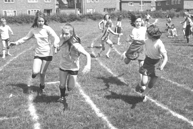 The Castle View Junior School sports day in 1976. We caught the action just as the baton was being handed over in the girls relay race.