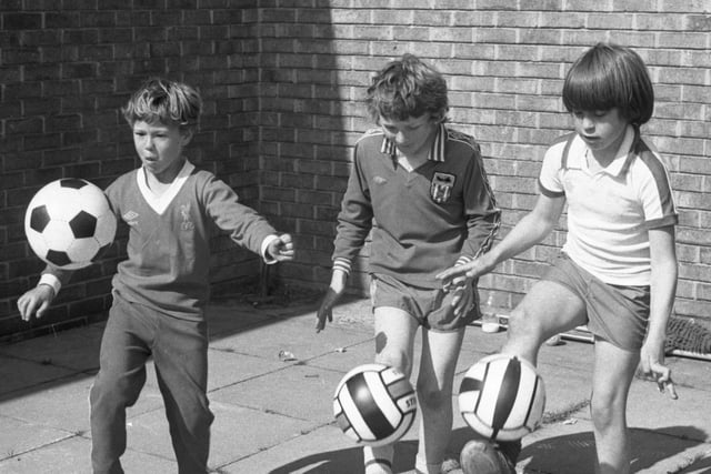 Trying to keep a ball of the ground for as long as possible at the Carley Hill Junior School's play scheme sports day. 
Pictured in 1979 were, left to right: Brian Forster, 9, Kenneth Jacques, 10, Stephen Fortune 10.
