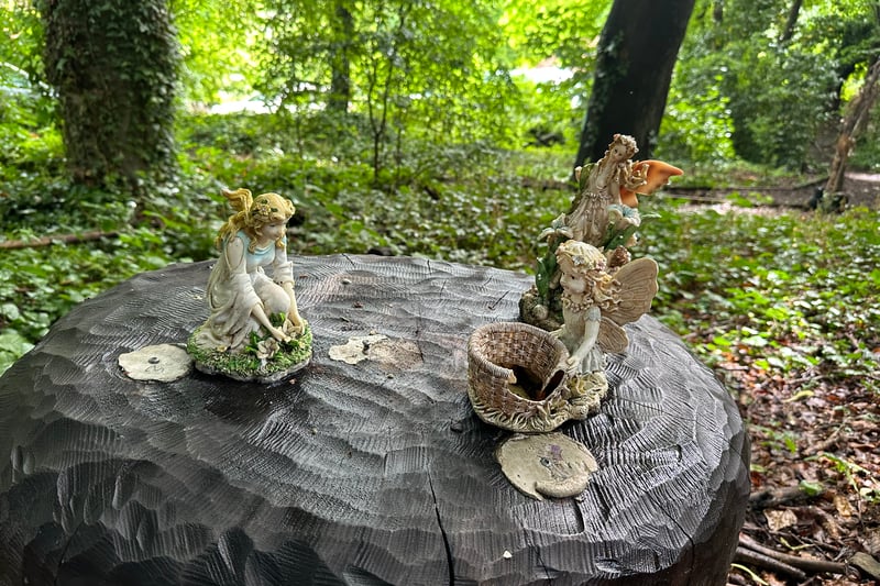 Here is one of the features showing a scene with three fairies on top of a wooden mushroom. The woodland was created in 2020.