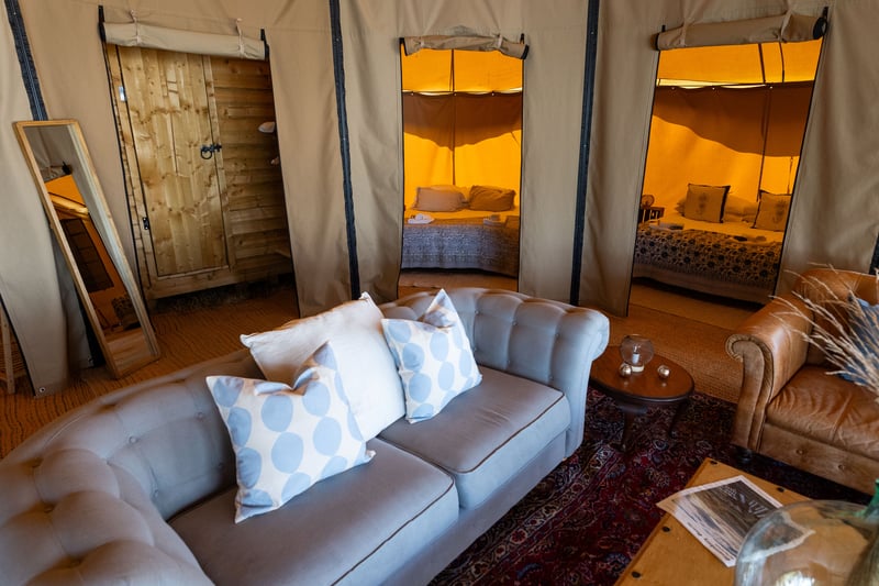 The tent sleeps up to eight guests