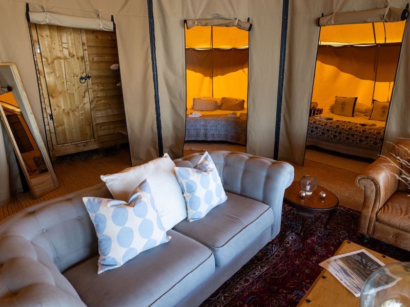 The tent sleeps up to eight guests