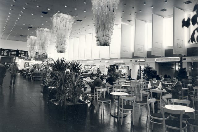 The low hanging chandeliers welcomed passengers in terminal 1
