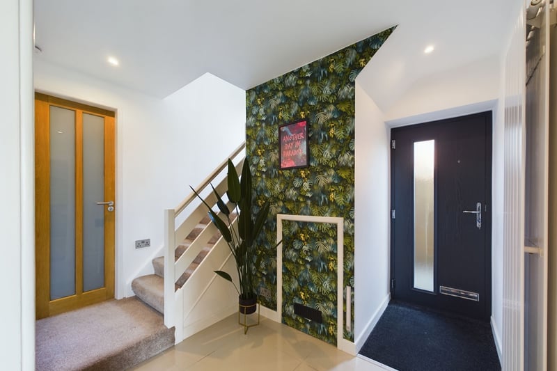 The entrance hall with access to the first floor, kitchen, living room, office and guest WC. Photo: Zoopla