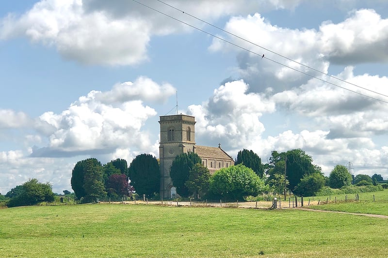 The Church of St John The Baptist is in the middle of a field, originally in order to protect villagers from the plague