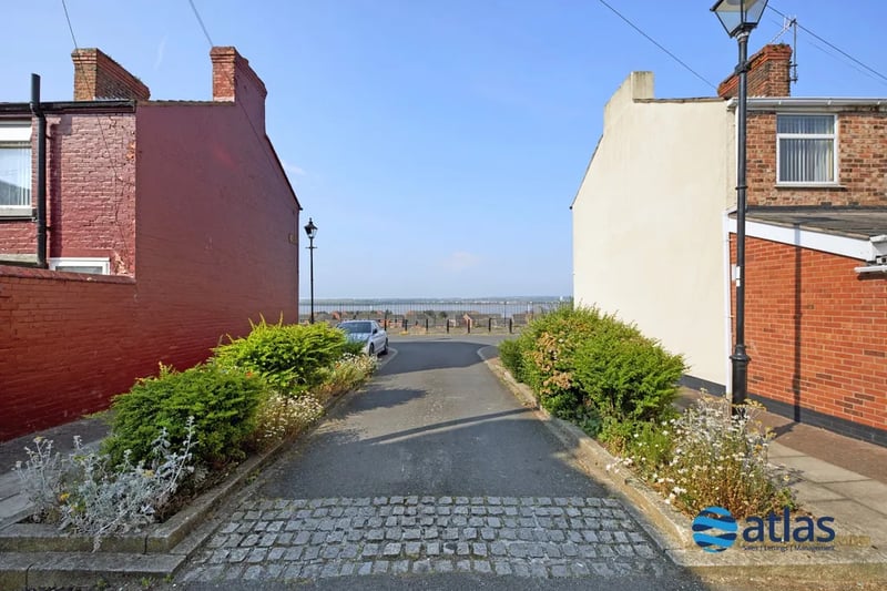 The property offers views down the street of the tranquil River Mersey.