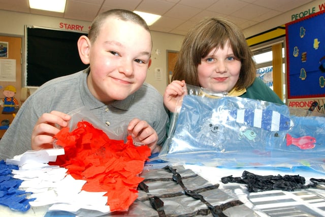 James Defries and Kersty Sims were making flags for a project at the school in 2006.