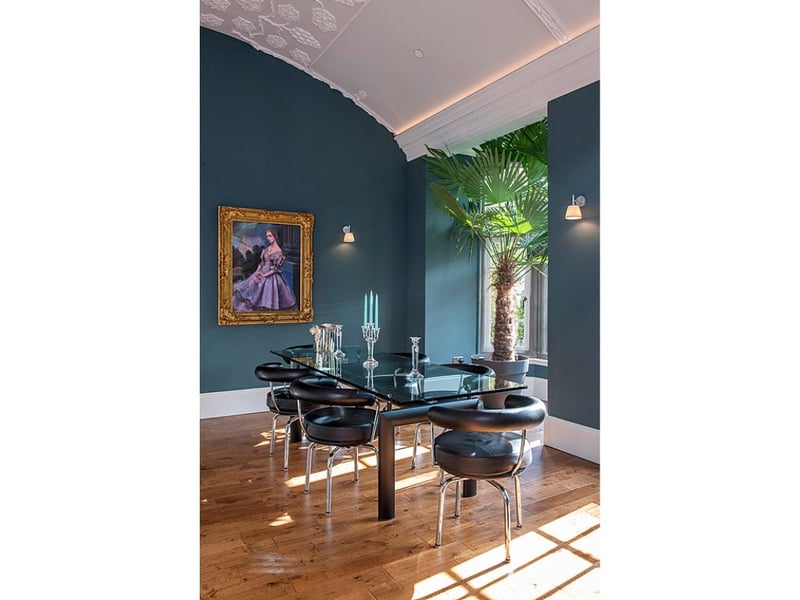The dining table has plenty of room for guests.