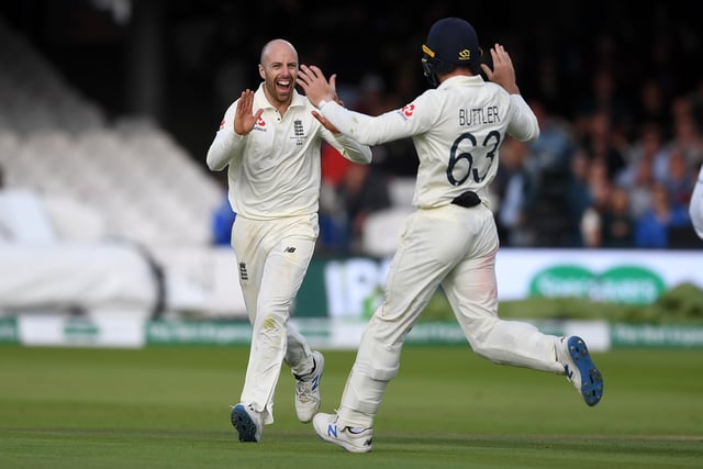 Jack Leach of England celebrates with Jos Buttler after dismissing Marnus Labuschagne of Australia during day five of the 2nd Specsavers Ashes Test match at Lord's Cricket Ground on August 18, 2019 in London, England. (Photo by Gareth Copley/Getty Images)