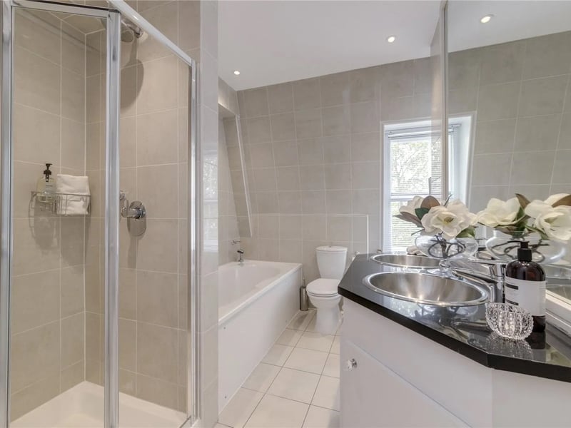 One of the bathrooms inside the luxury penthouse