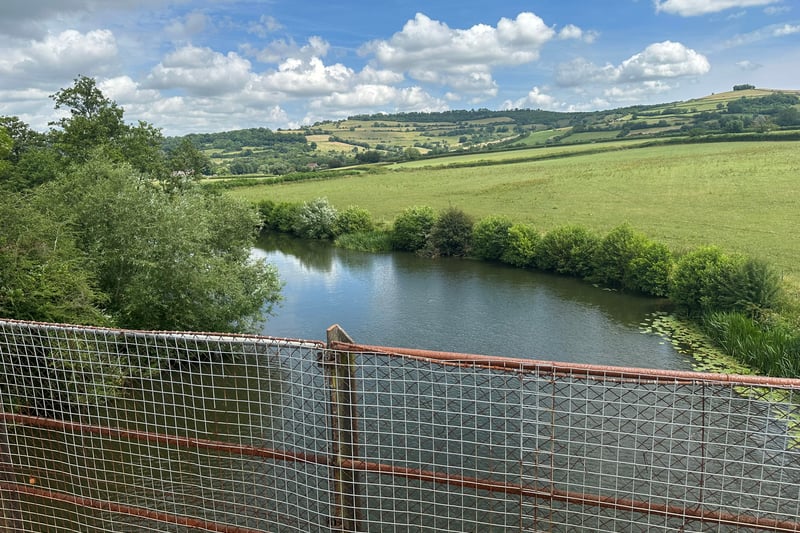 Looking over to the other side of the bridge you can see up to Kelston Round Hill with the collection of trees at its peak. There is a walk way up to the village of Kelston where there is a cheese cafe and shop and a pub.