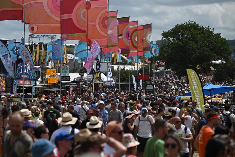 Festivalgoers attend day 3 of the Glastonbury festival in the village of Pilton in Somerset, southwest England, on June 23, 2023. The festival takes place from June 21 to June 26. (Photo by Oli SCARFF / AFP) (Photo by OLI SCARFF/AFP via Getty Images)