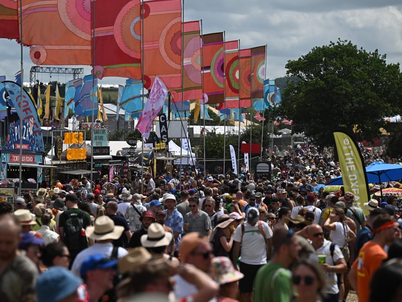 Festivalgoers attend day 3 of the Glastonbury festival in the village of Pilton in Somerset, southwest England, on June 23, 2023. The festival takes place from June 21 to June 26. (Photo by Oli SCARFF / AFP) (Photo by OLI SCARFF/AFP via Getty Images)